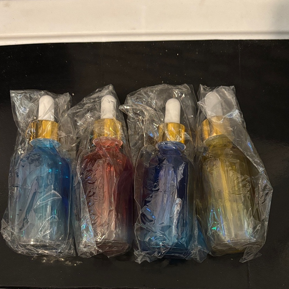 New 4 Glass DropperBottles